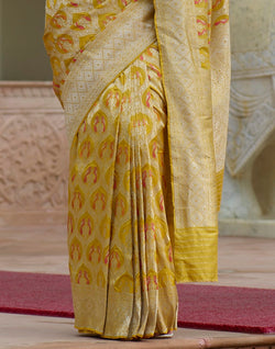 Collection of Bright Yellow Coloured Pure Kataan Banaras Saree in a gallery layout