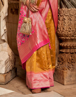 Collection of Mustard Butta Soft Banaras Patola Saree in a gallery layout