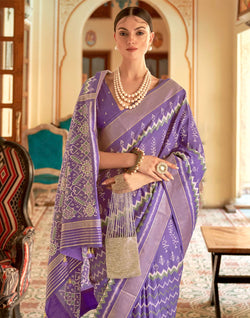 Collection of Purple Patola Ikat Print Elegant Saree in a gallery layout