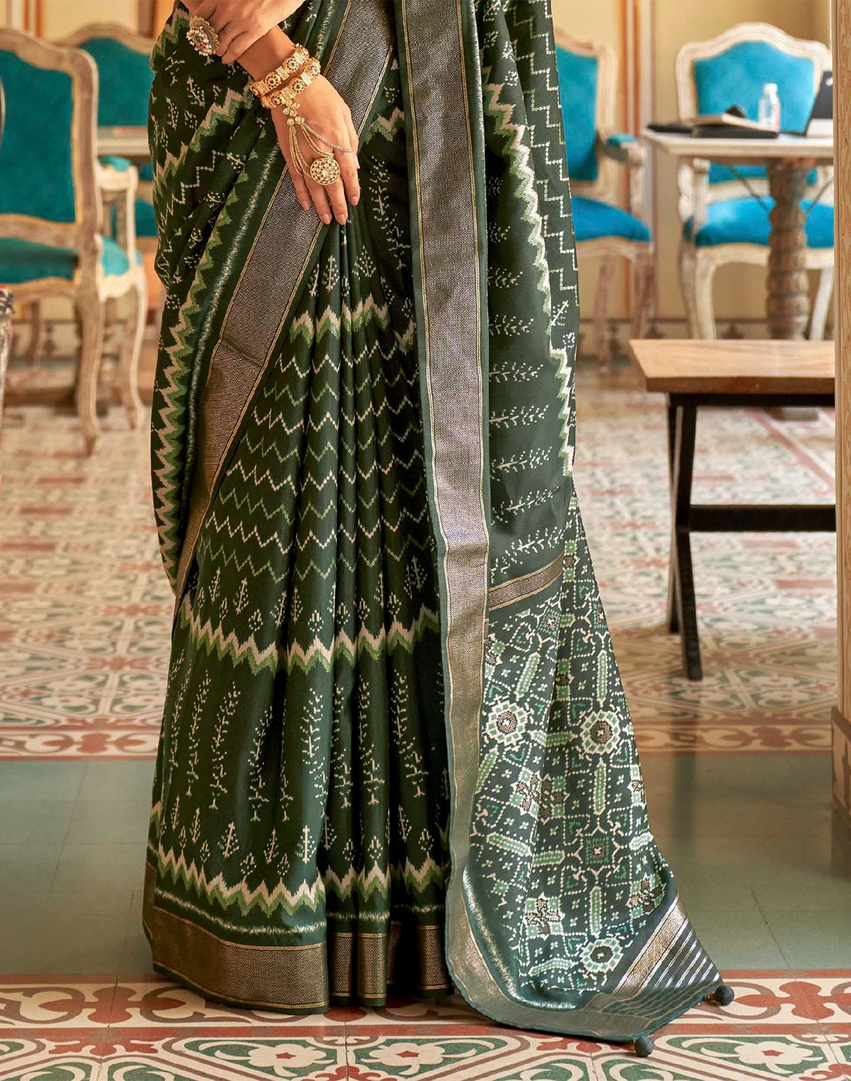 Collection of Royal Dark Green Patola Silk Ikat Saree in a gallery layout