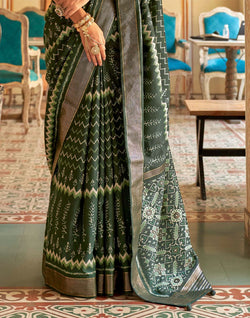 Collection of Royal Dark Green Patola Silk Ikat Saree in a gallery layout