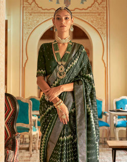 Collection of Royal Dark Green Patola Silk Ikat Saree in a gallery layout