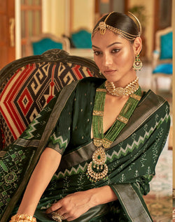 Collection of Royal Dark Green Patola Silk Ikat Saree in a gallery layout