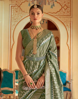 Collection of Olive Green Ikat Print Patola Silk Saree in a gallery layout