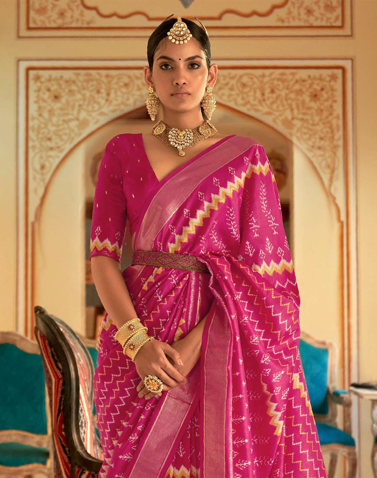 Collection of Dazzling Magenta Patola Silk Saree in a gallery layout