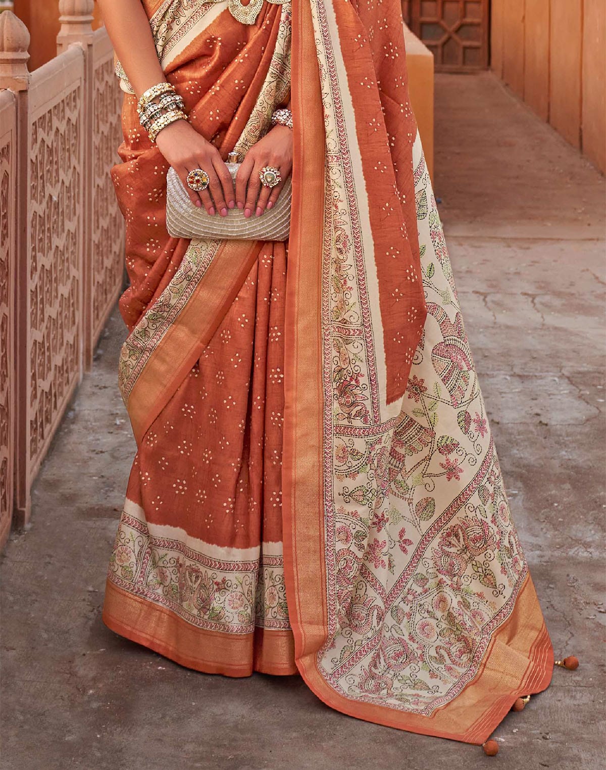 Collection of Pretty Orange Designer Jute Silk Saree With Kalamkari Border and Pallu in a gallery layout