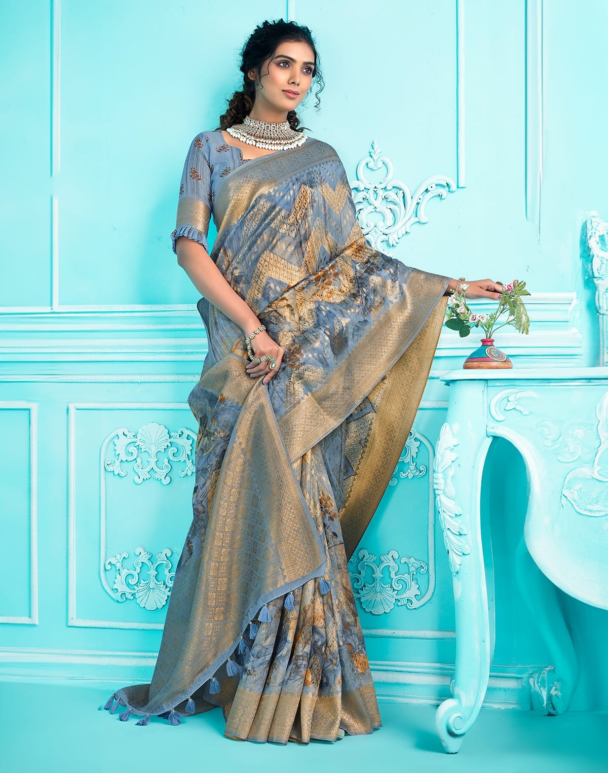 Collection of Sky Blue Floral digital print with zari weaving Organza Saree in a gallery layout