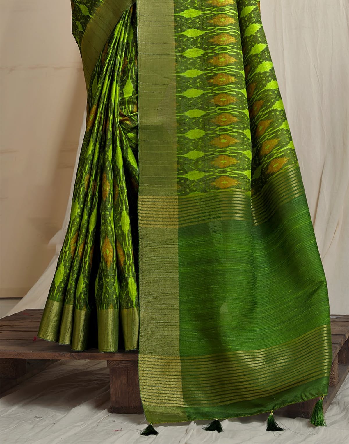 Collection of Parrot Green Ikat Style Tussar Silk Saree in a gallery layout