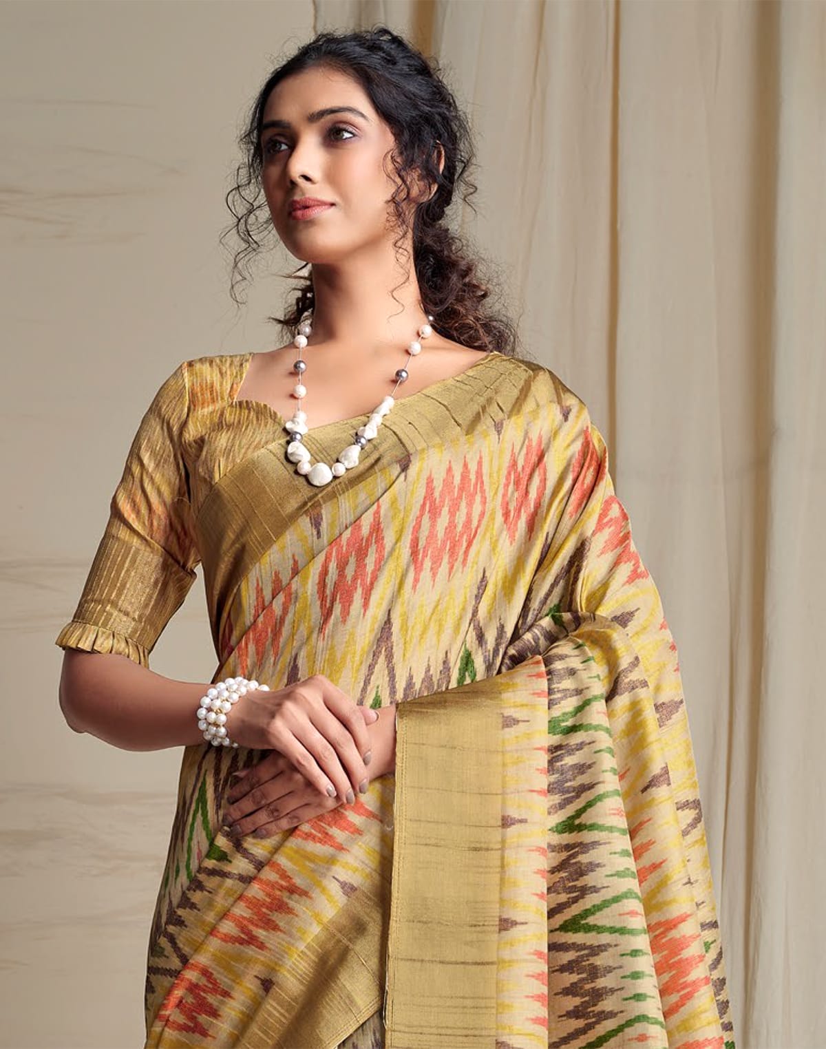 Collection of Beige Handloom Ikat Print Tussar Silk Saree in a gallery layout