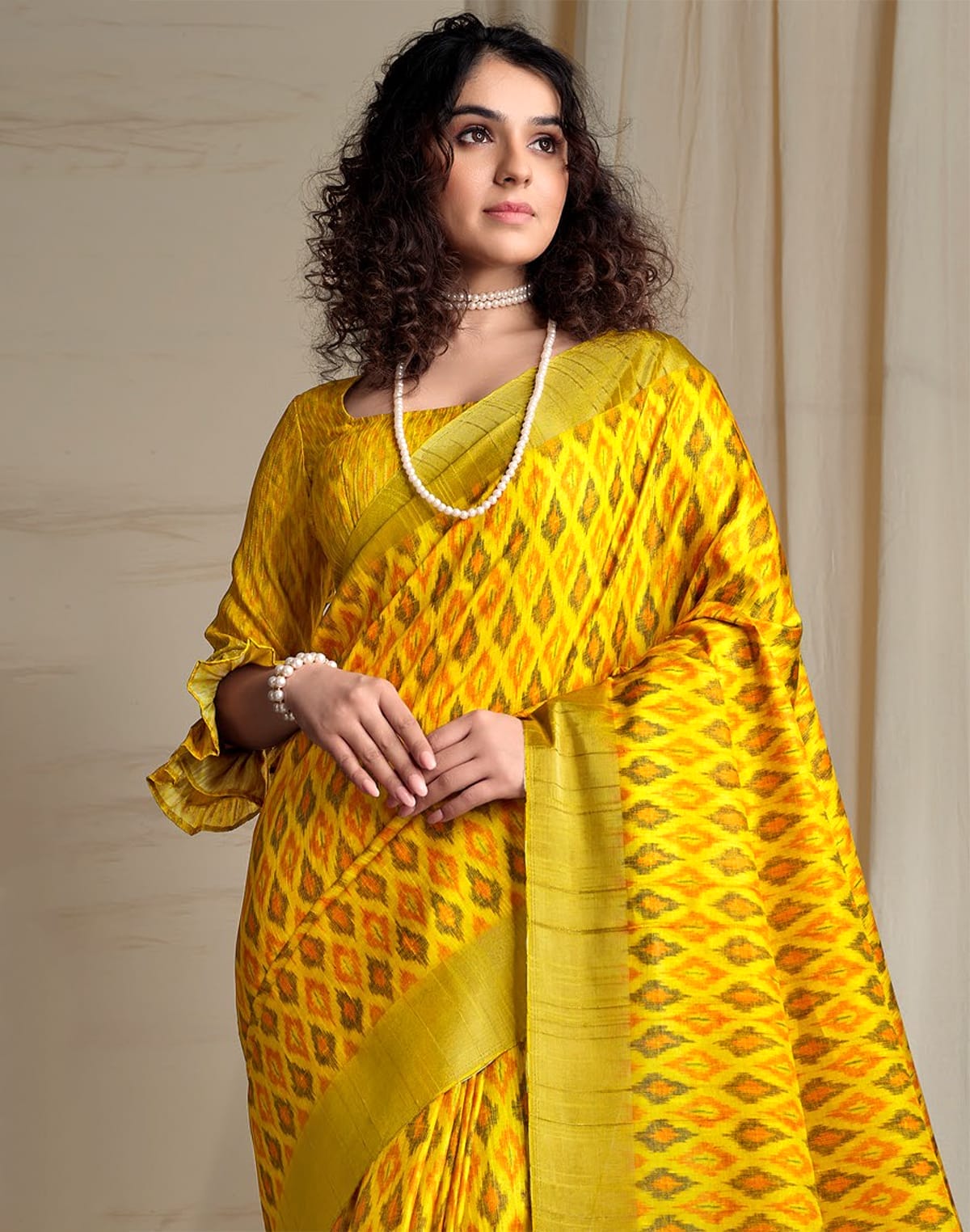 Collection of Yellow Tussar Silk Ikat Printed Saree in a gallery layout