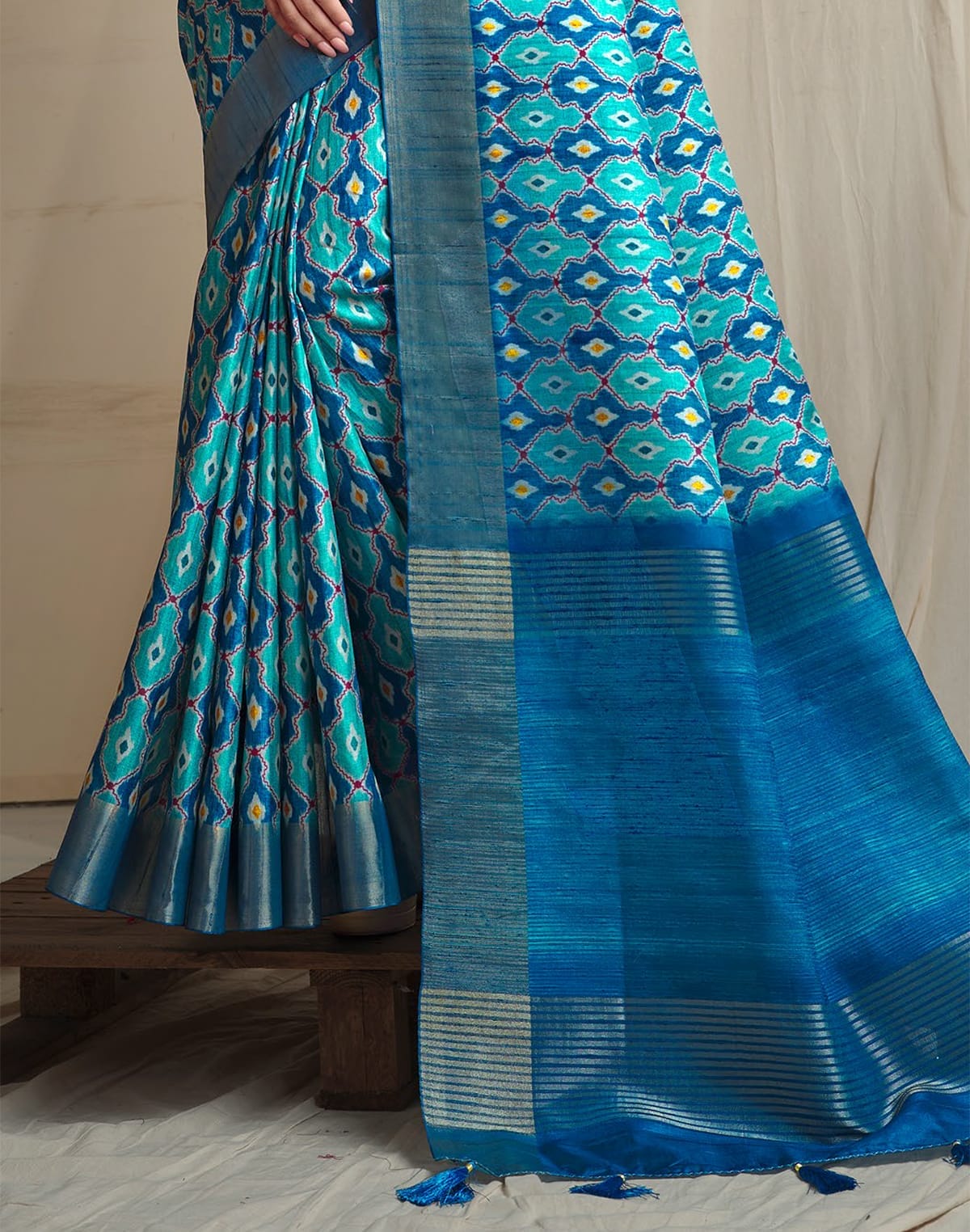 Collection of Sky Blue Coloured Ikat Printed Tussar Silk Saree in a gallery layout