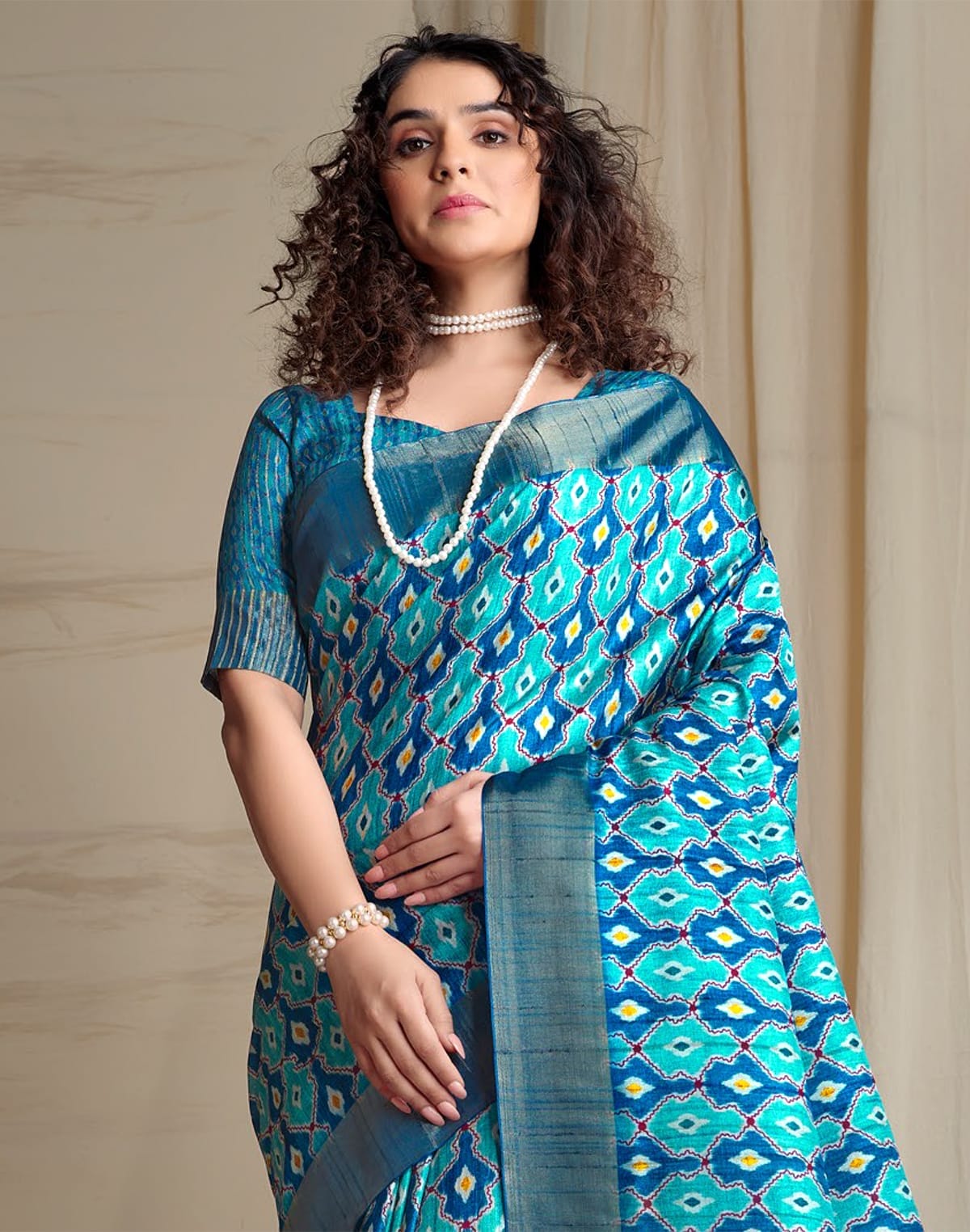 Collection of Sky Blue Coloured Ikat Printed Tussar Silk Saree in a gallery layout