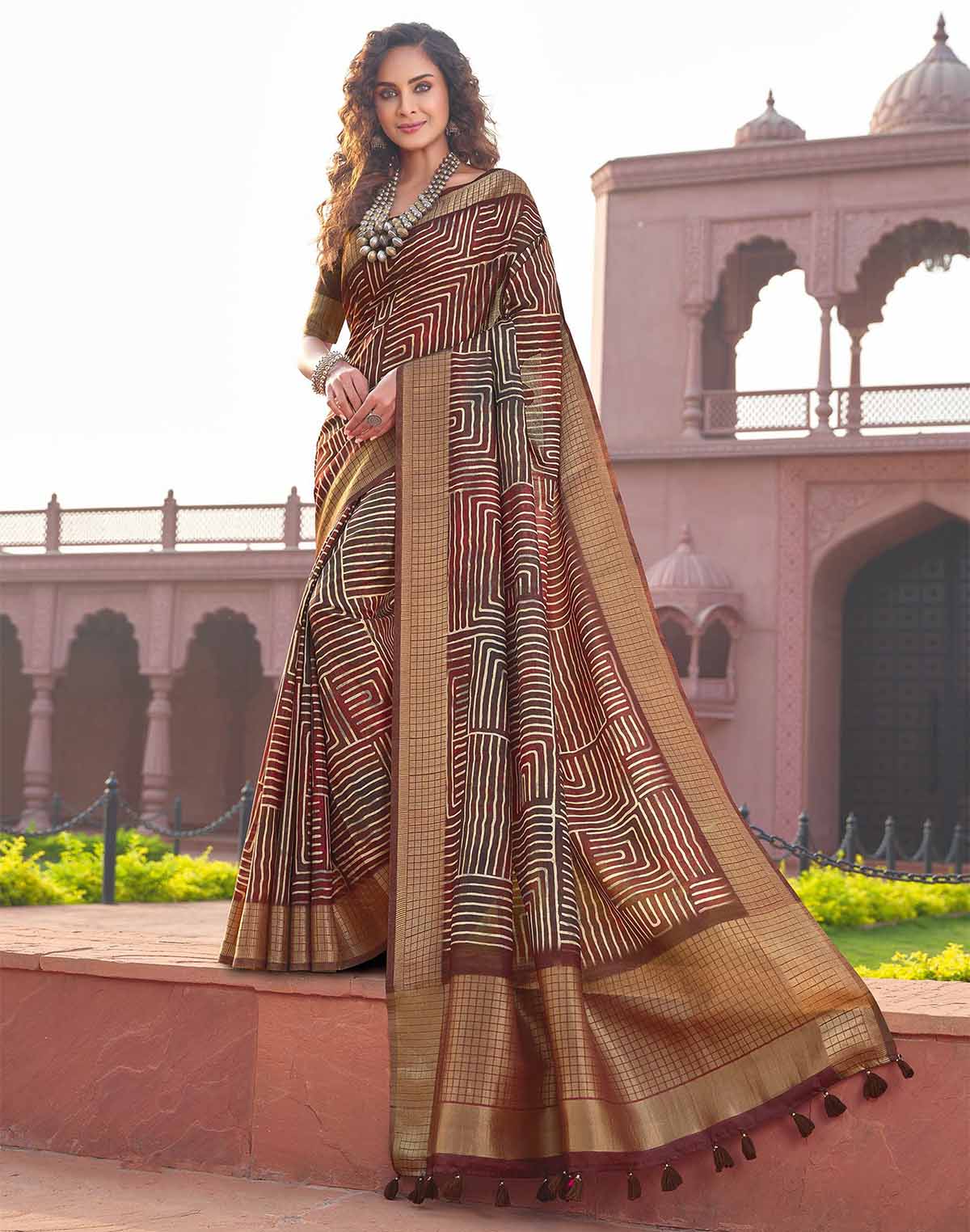 Collection of Jute Silk Brown Colour Fancy Saree in a gallery layout