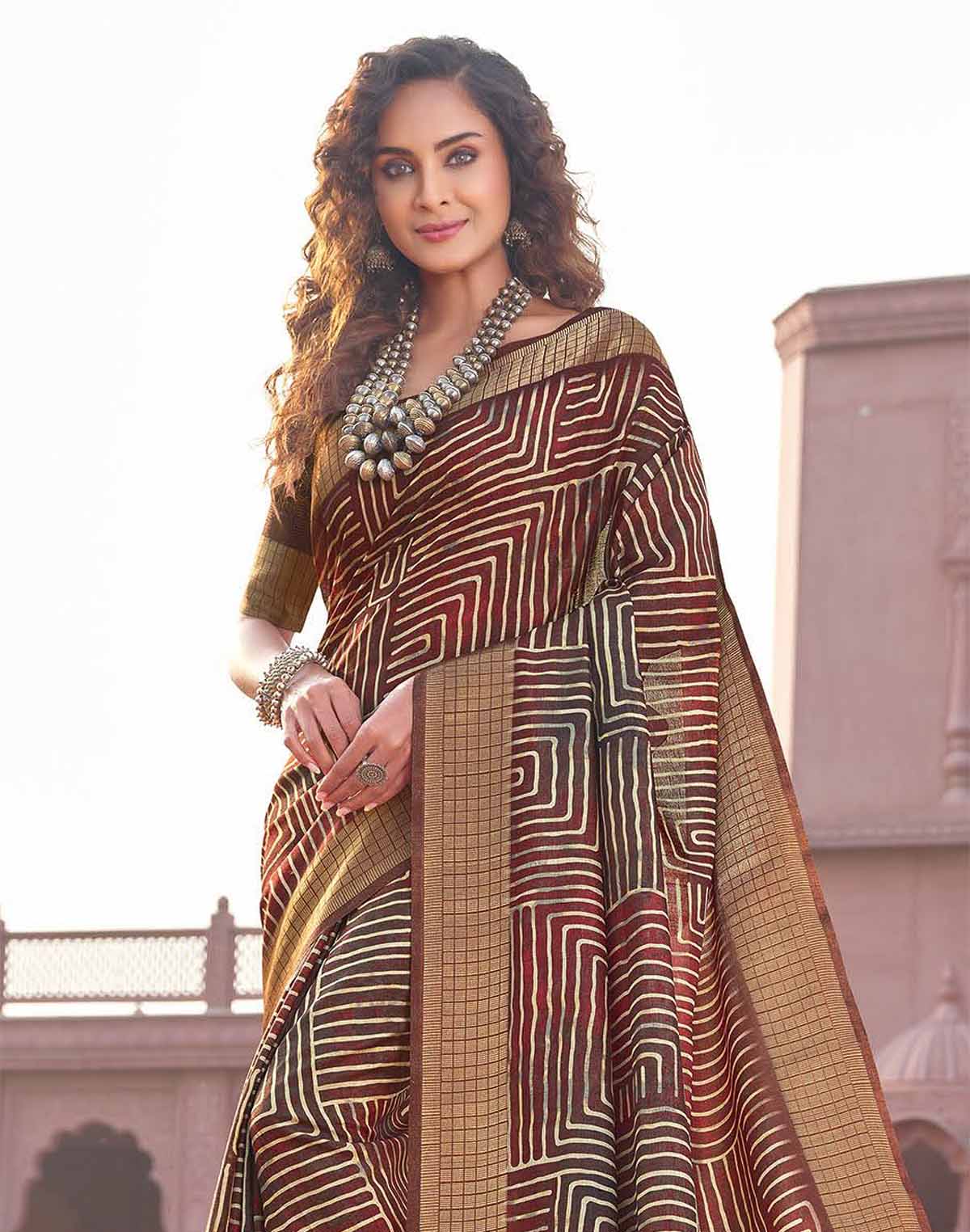 Collection of Jute Silk Brown Colour Fancy Saree in a gallery layout