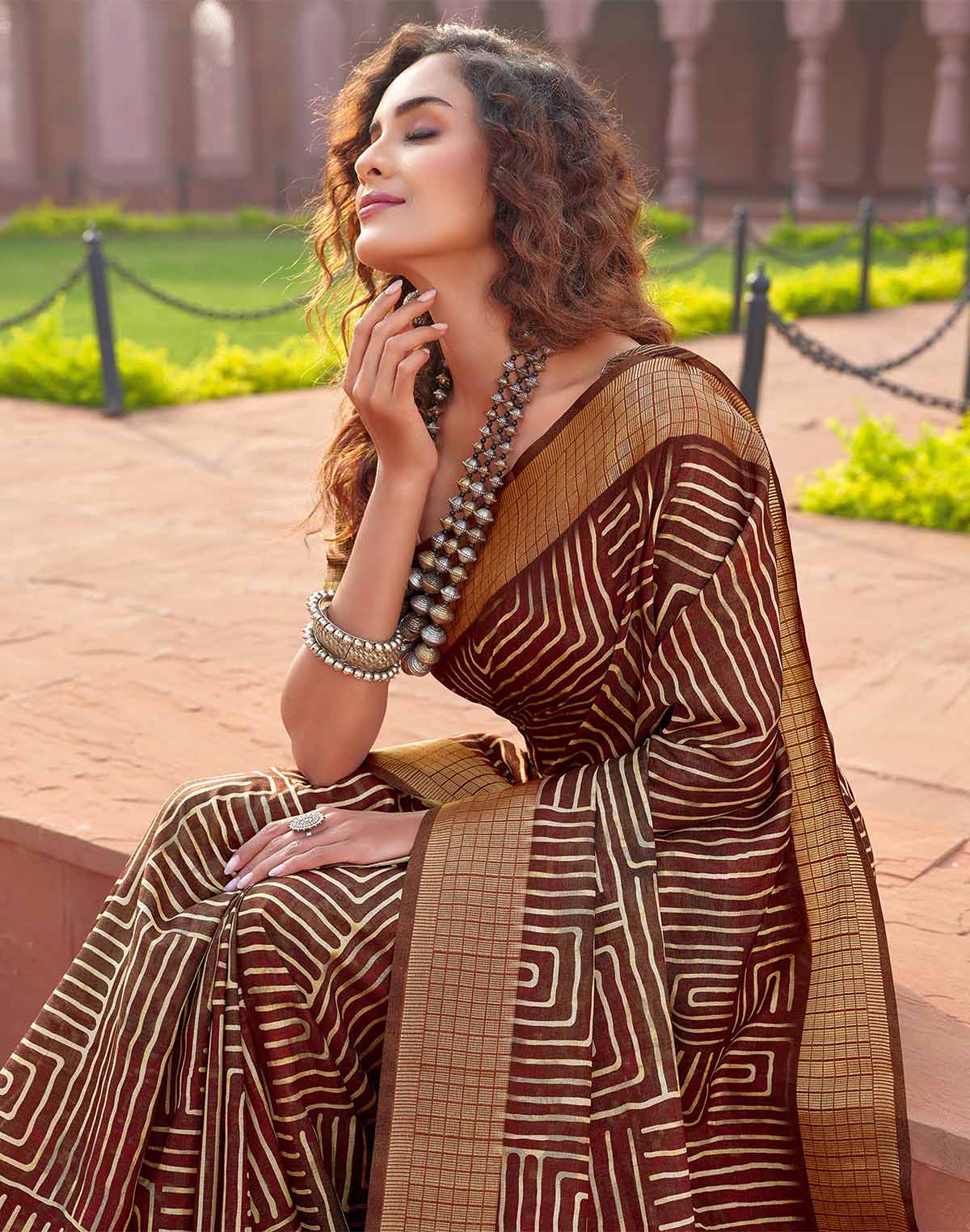 Collection of Jute Silk Brown Colour Fancy Saree in a gallery layout