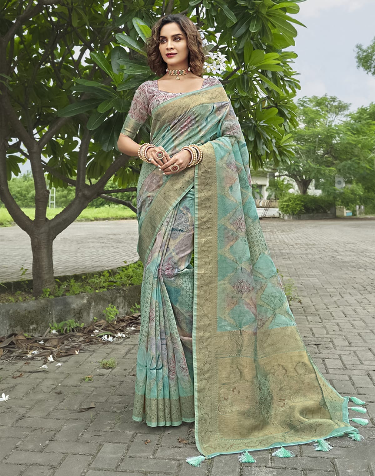 Collection of Beautiful Sea Green Floral Designer Jute Saree in a gallery layout