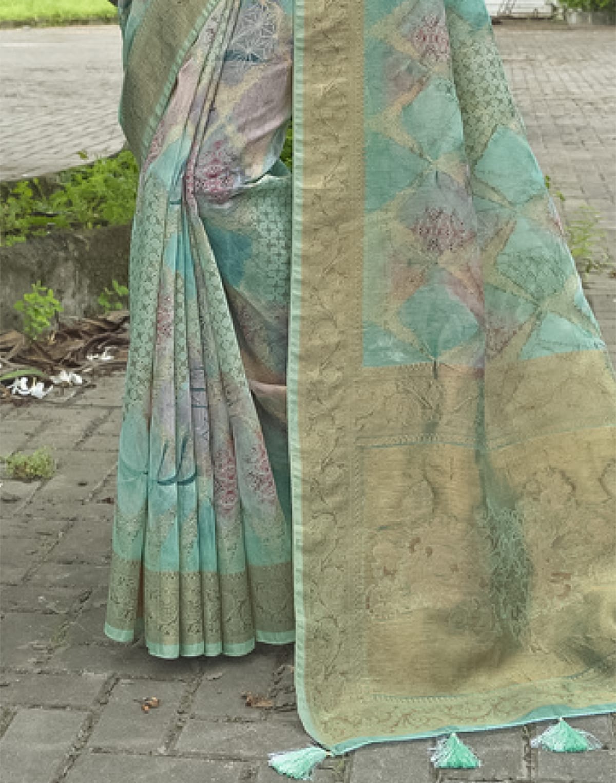 Collection of Beautiful Sea Green Floral Designer Jute Saree in a gallery layout