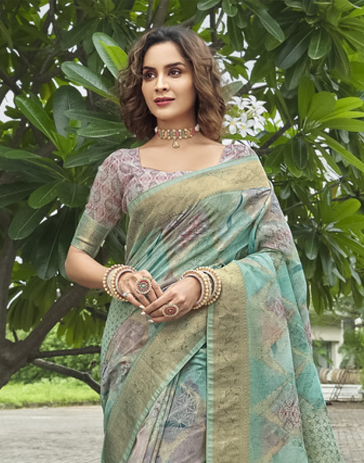 Collection of Beautiful Sea Green Floral Designer Jute Saree in a gallery layout