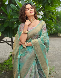 Collection of Beautiful Sea Green Floral Designer Jute Saree in a gallery layout