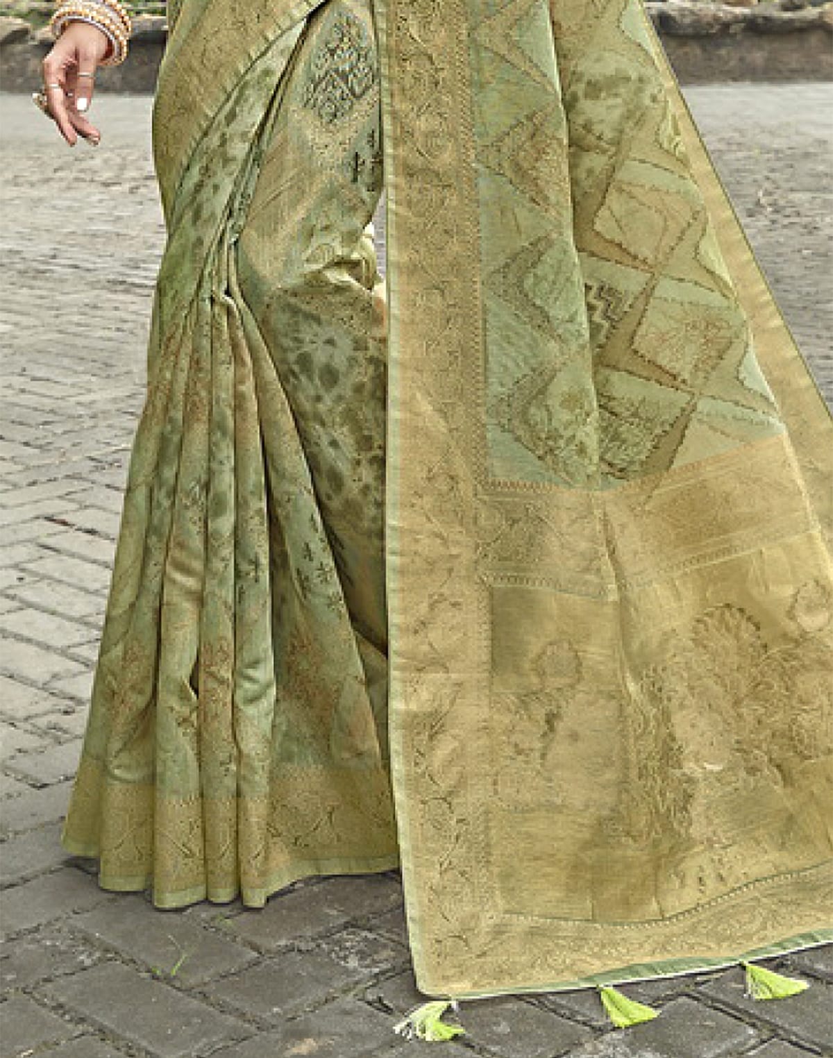 Collection of Gorgeous Light Green Jute Saree in a gallery layout