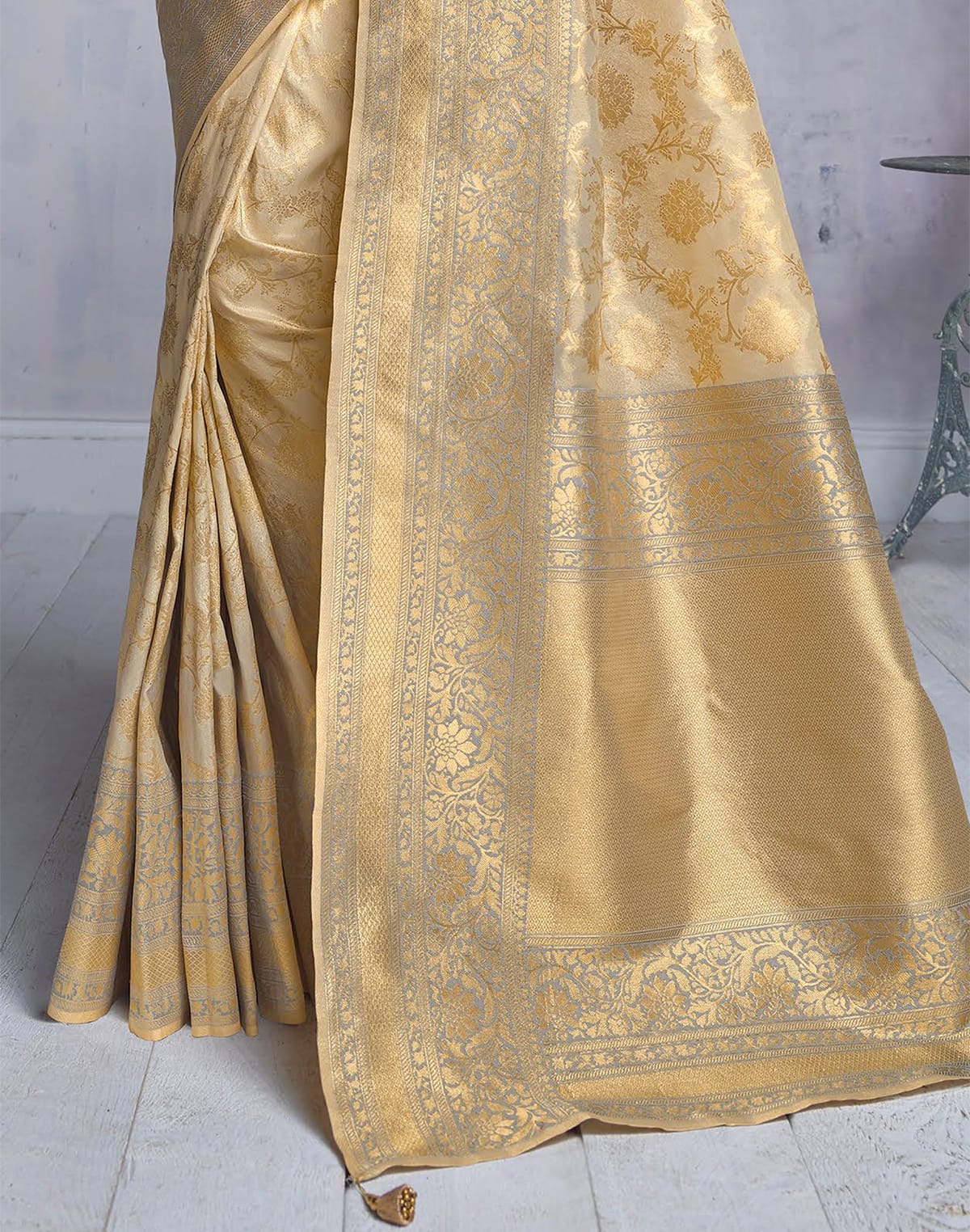 Collection of Pretty Matte Gold Banaras Tissue Fabric Saree in a gallery layout