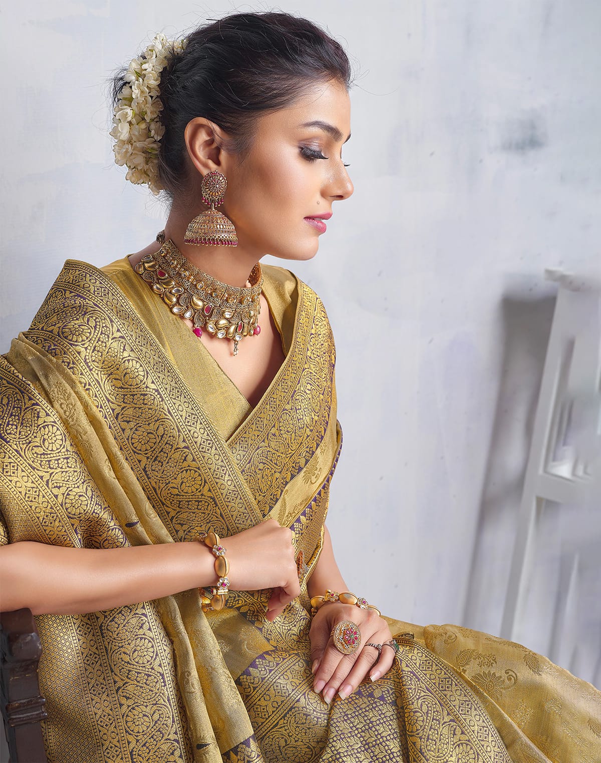 Gold Coloured all over Paisely design Banaras Tissue Saree