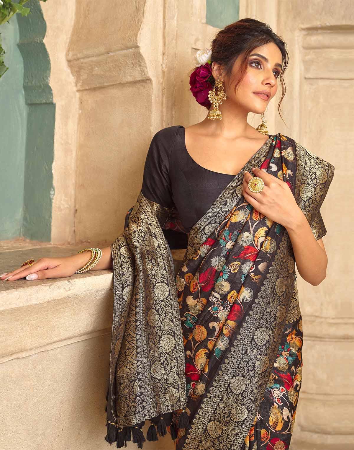 Collection of Black Coloured Floral Print Dola Silk Saree in a gallery layout