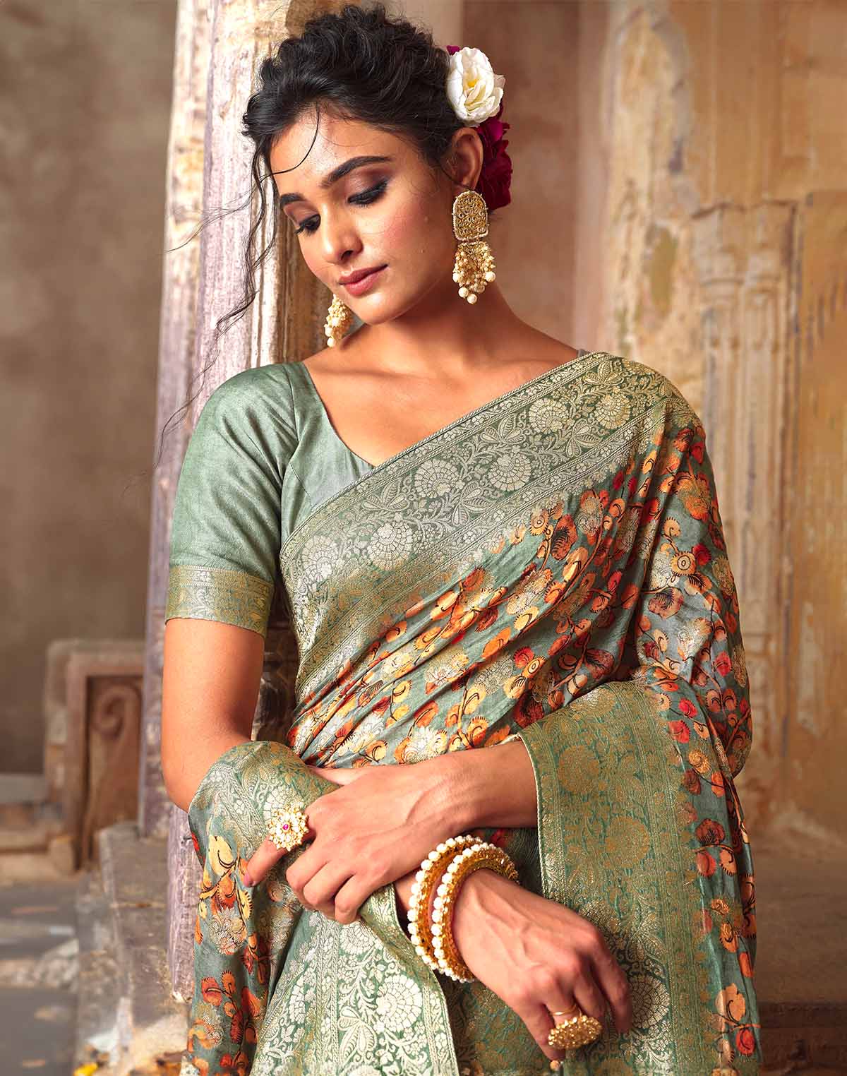 Collection of Light Green Dola Silk all over Woven Zari and Floral Print Saree in a gallery layout