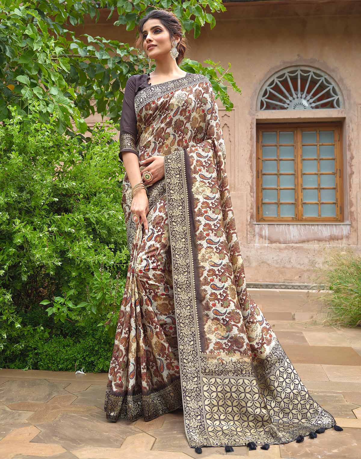 Collection of Beautiful Beige all over Paisely and Floral Print Dola Silk Saree in a gallery layout