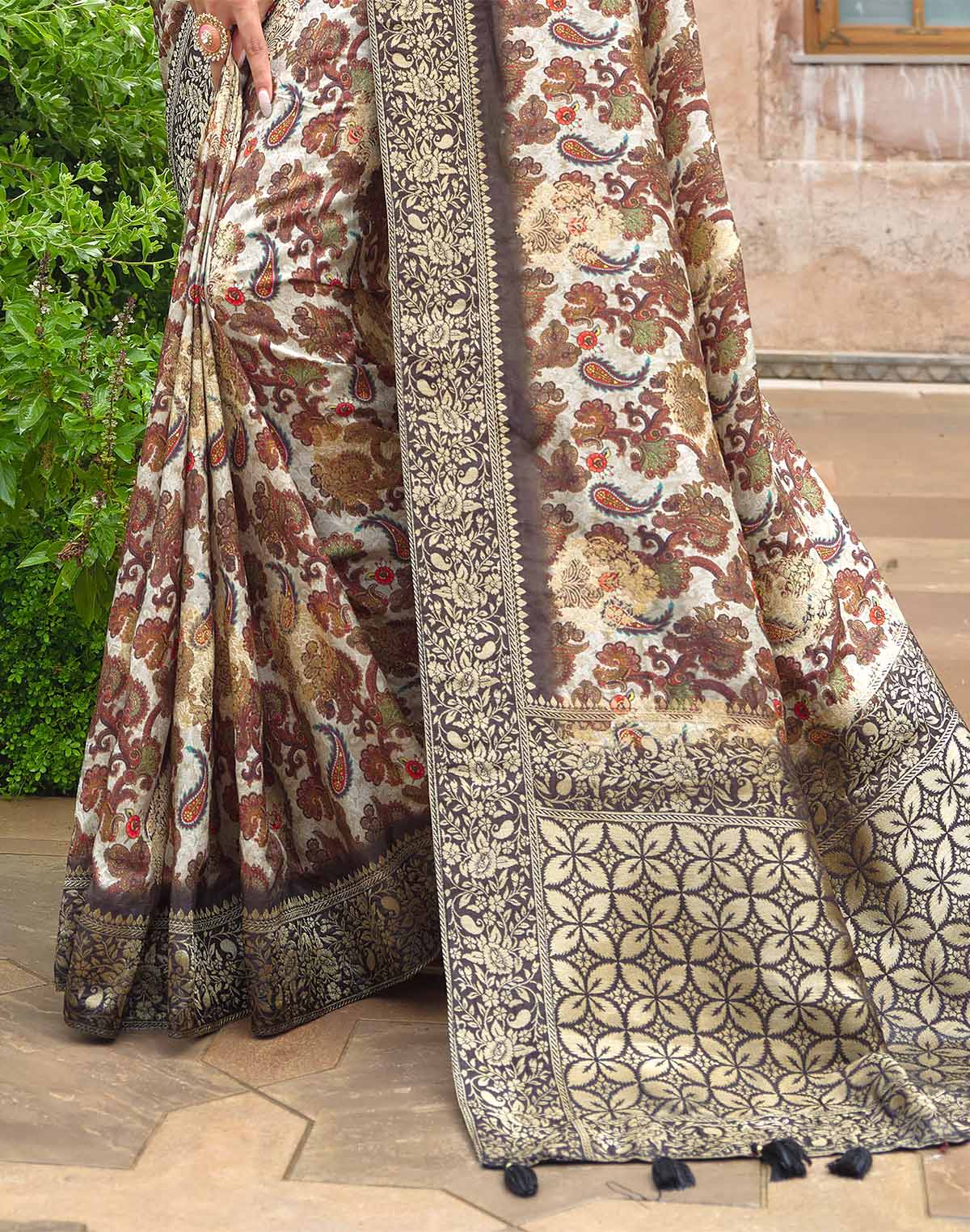 Collection of Beautiful Beige all over Paisely and Floral Print Dola Silk Saree in a gallery layout