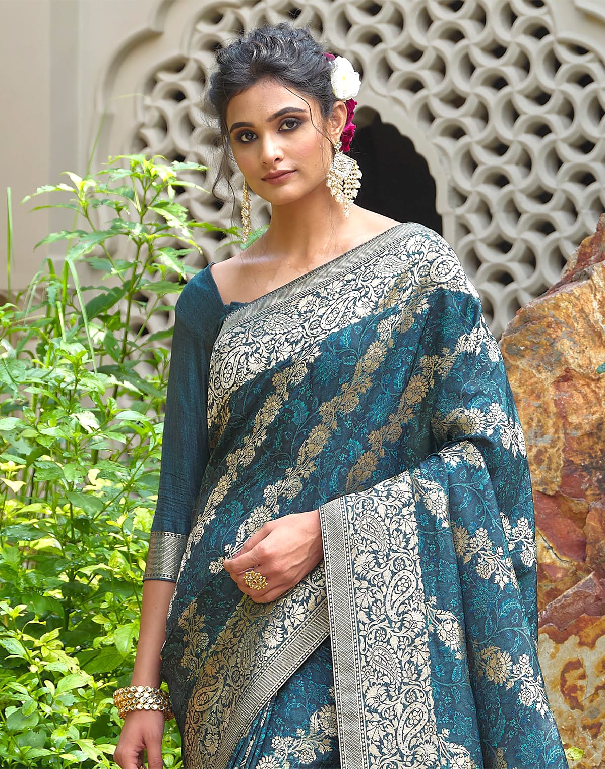 Collection of Peacock Blue Floral Dola Silk Designer Saree in a gallery layout