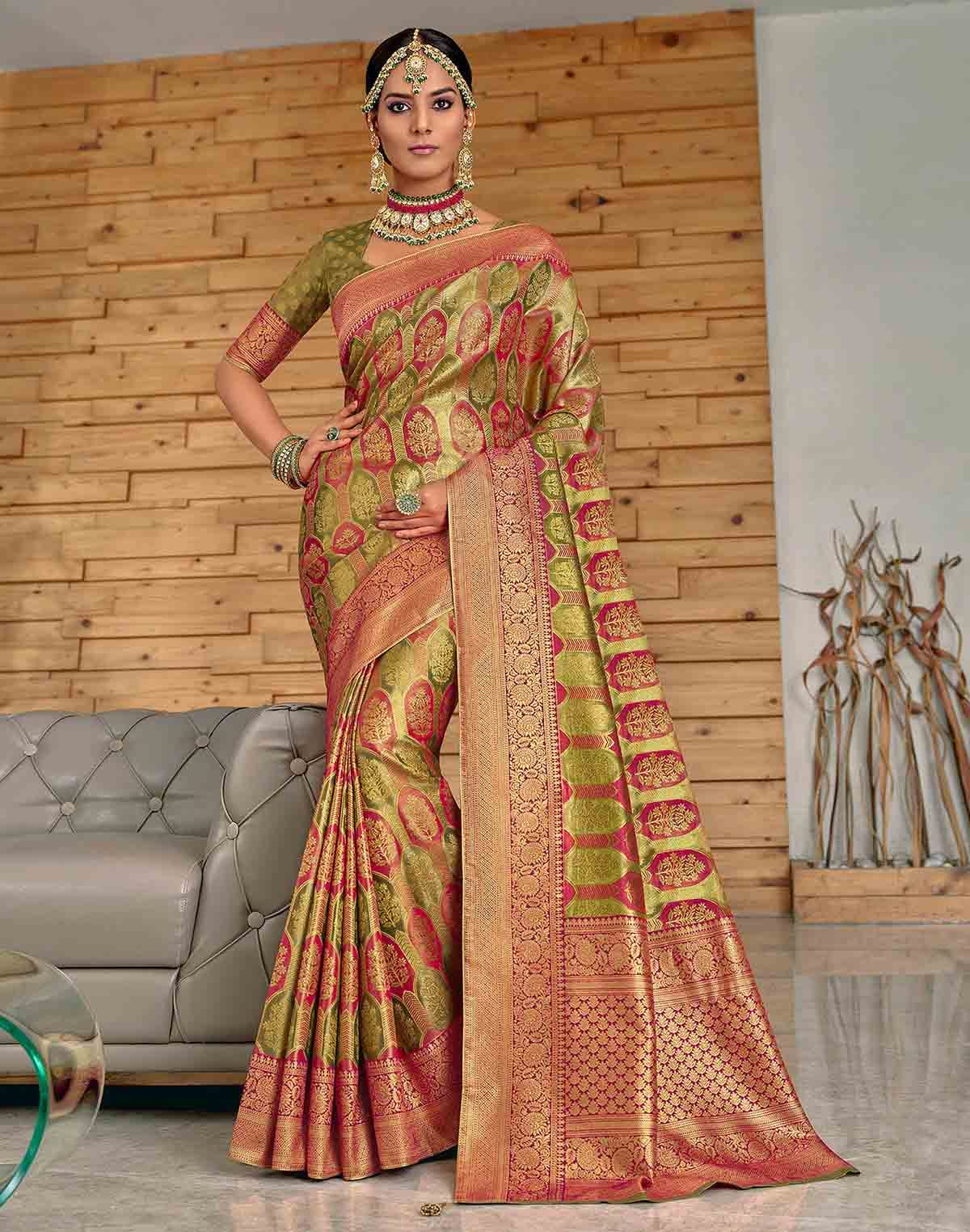 Collection of Mehendi Green Botanical Meena work Padiya Banaras Tissue Saree in a gallery layout