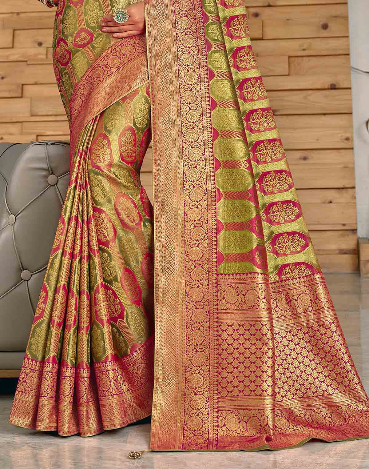 Collection of Mehendi Green Botanical Meena work Padiya Banaras Tissue Saree in a gallery layout