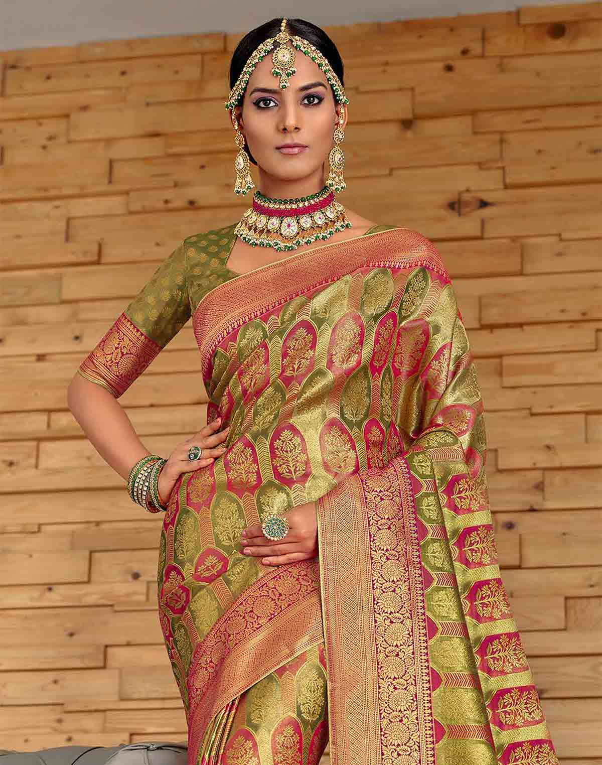 Collection of Mehendi Green Botanical Meena work Padiya Banaras Tissue Saree in a gallery layout