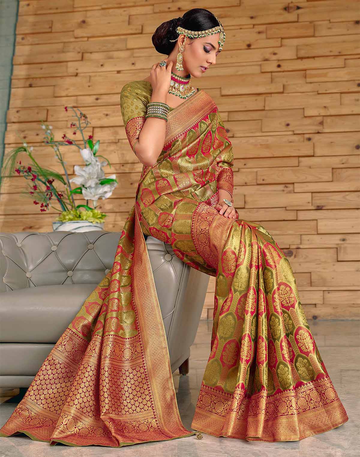 Collection of Mehendi Green Botanical Meena work Padiya Banaras Tissue Saree in a gallery layout