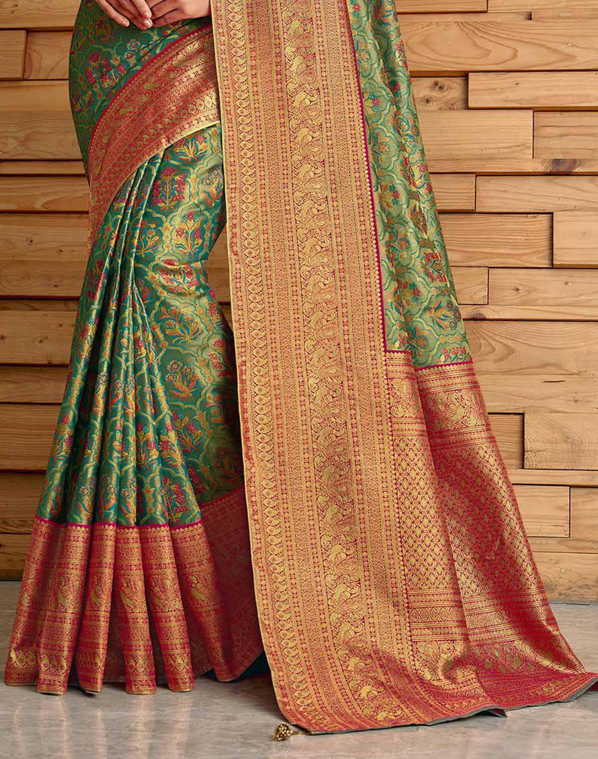 Collection of Green Floral Meena work Padiya Banaras Tissue Saree in a gallery layout