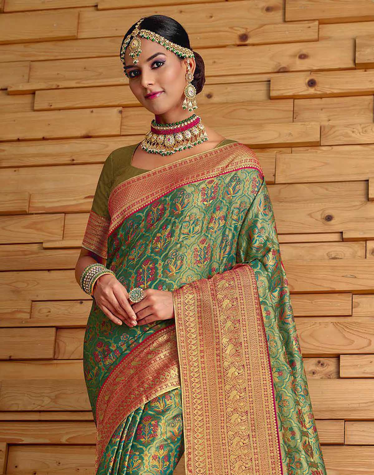 Collection of Green Floral Meena work Padiya Banaras Tissue Saree in a gallery layout