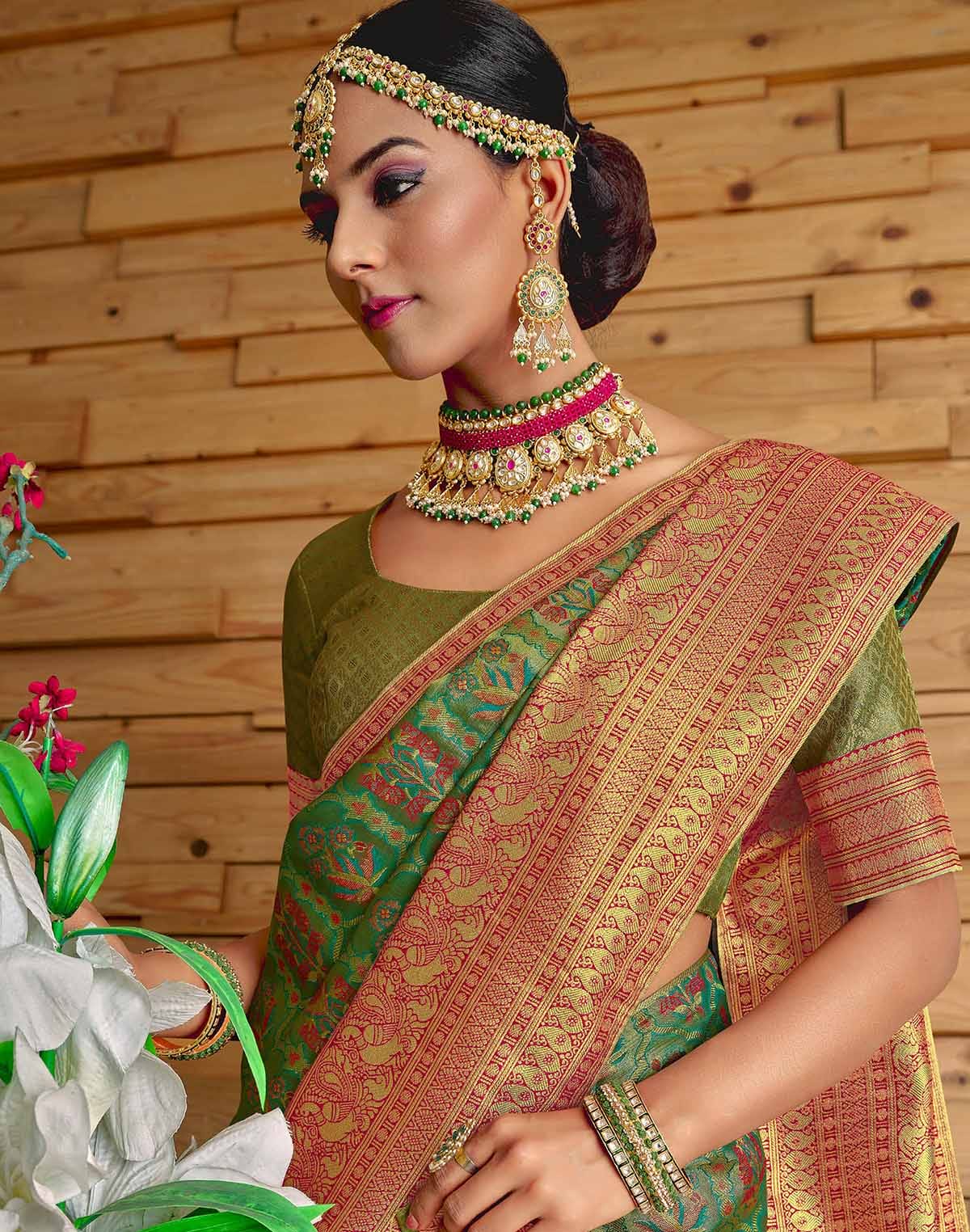 Collection of Green Floral Meena work Padiya Banaras Tissue Saree in a gallery layout