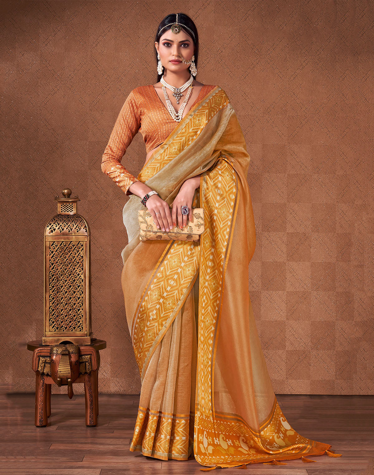 Orange and Grey Shaded Georgette Saree With Tussels