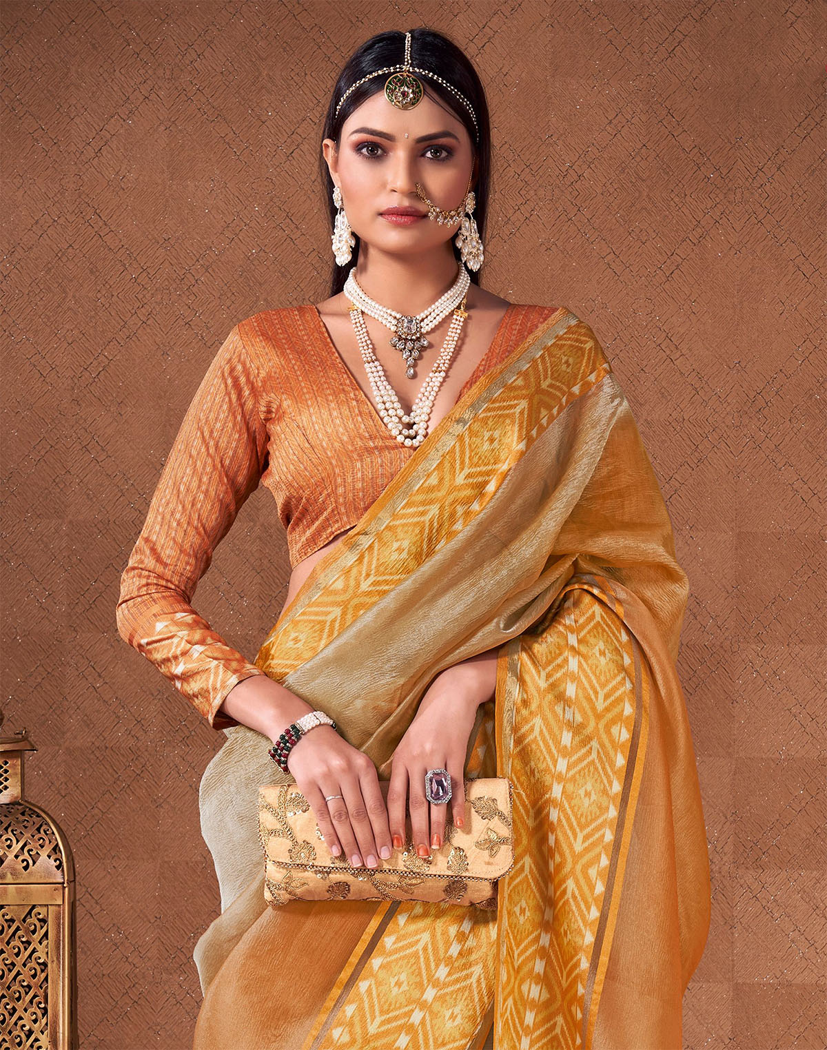 Collection of Orange and Grey Shaded Georgette Saree With Tussels in a gallery layout