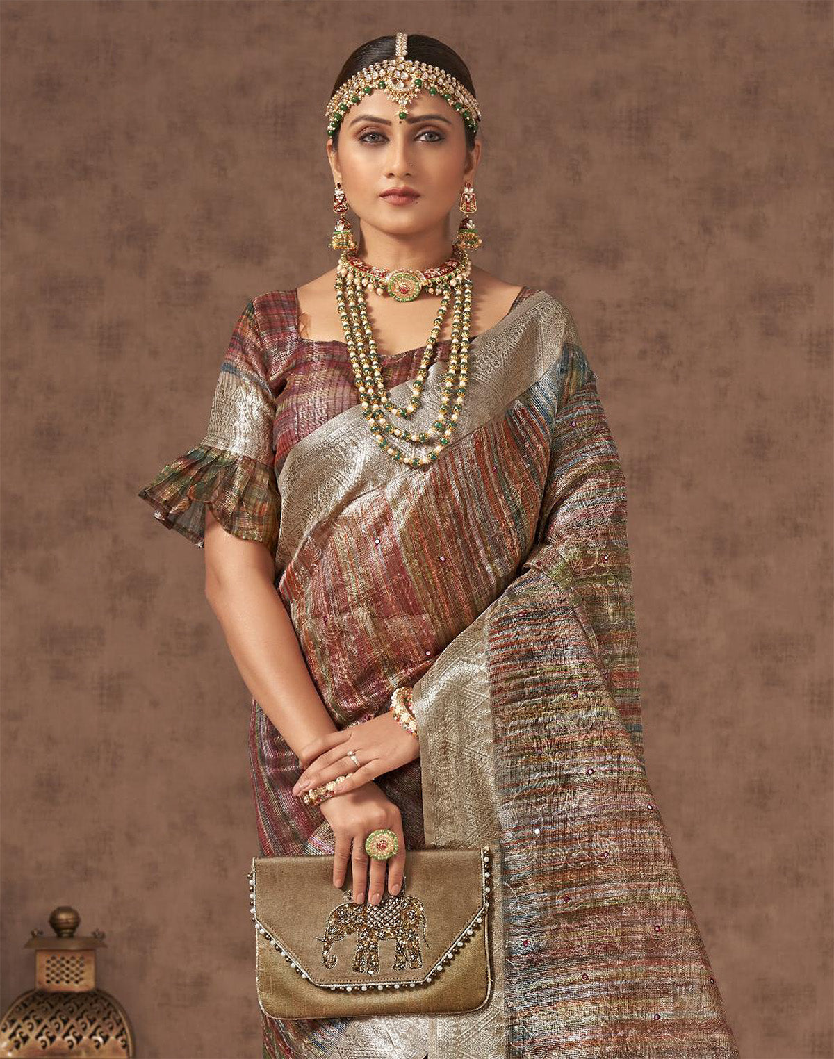 Collection of Light Brown Sequence With Mirror Work Organza Saree in a gallery layout