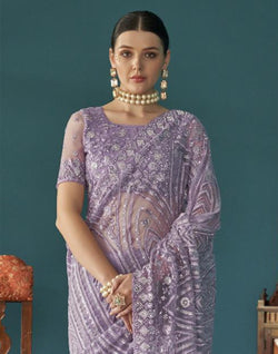 Collection of Purple Floral Embroidery and Stones Work Netted Saree With Designer Blouse in a gallery layout