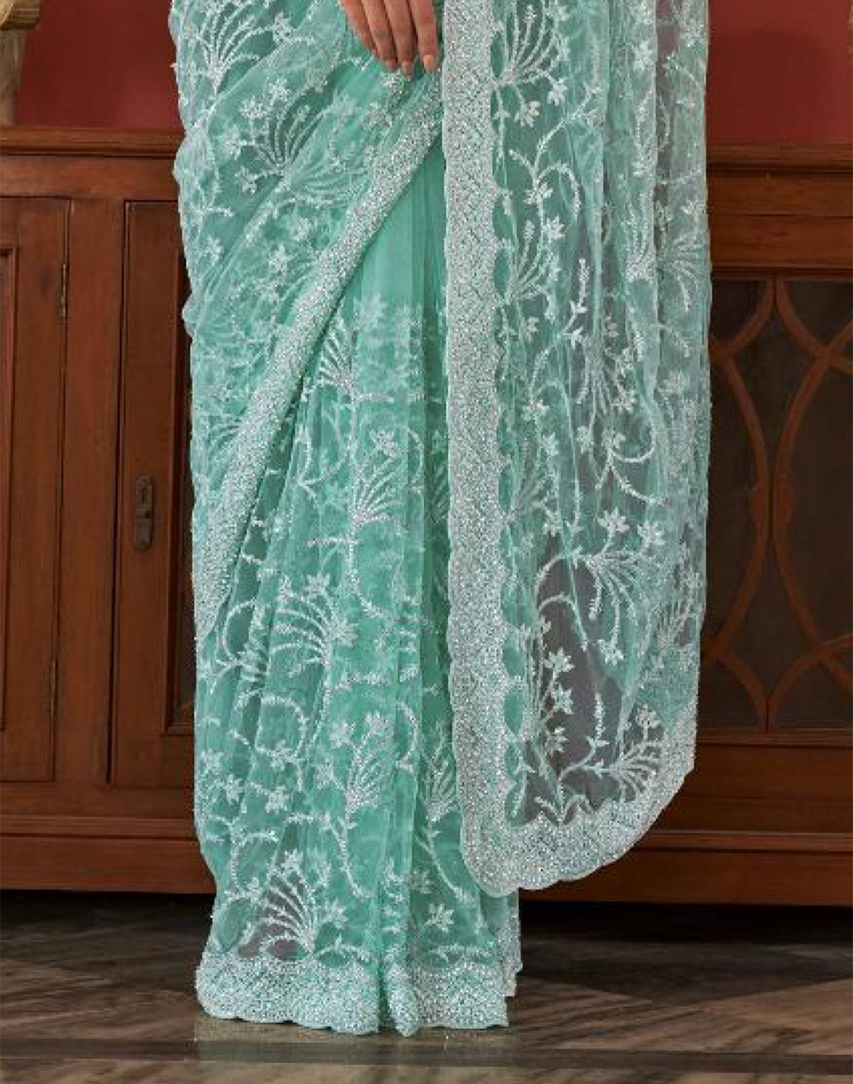 Collection of Sea Green All Over Floral Embroidery Work Netted Saree With Designer Blouse in a gallery layout