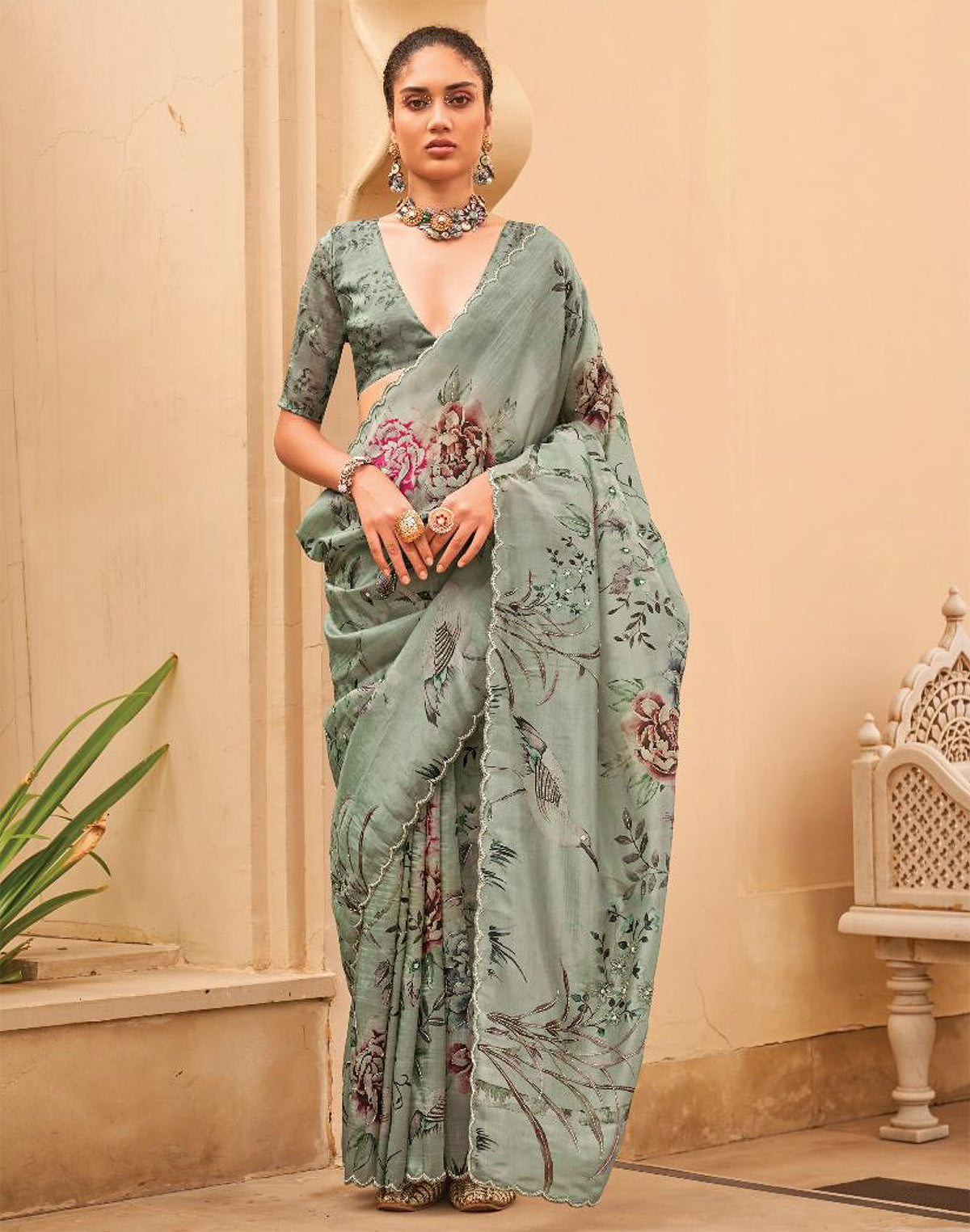 Collection of Light Green All Over Floral Printed  Party Wear Organza Saree in a gallery layout