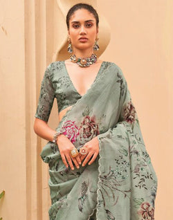 Collection of Light Green All Over Floral Printed  Party Wear Organza Saree in a gallery layout