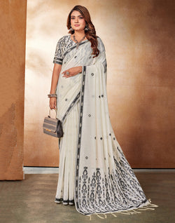 Collection of White Coloured Printed Cotton Silk Saree in a gallery layout