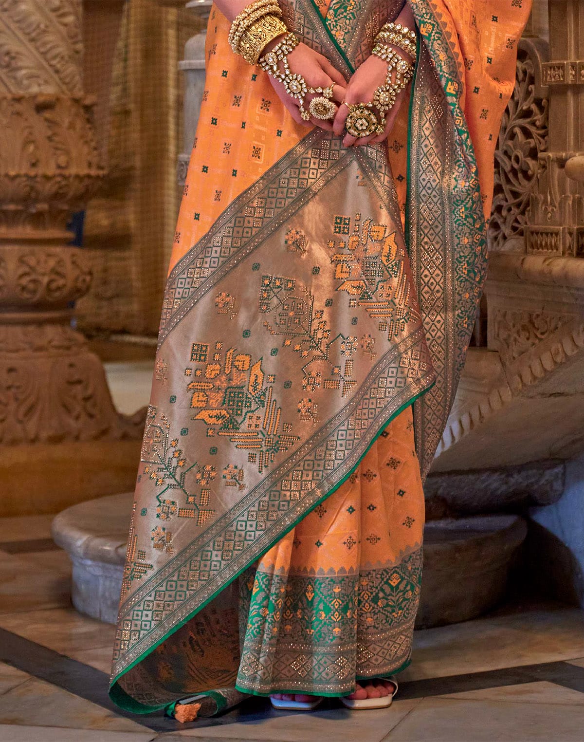 Collection of Orange Banaras Silk Stones work Saree in a gallery layout