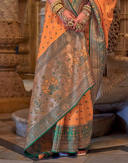 Collection of Orange Banaras Silk Stones work Saree in a gallery layout