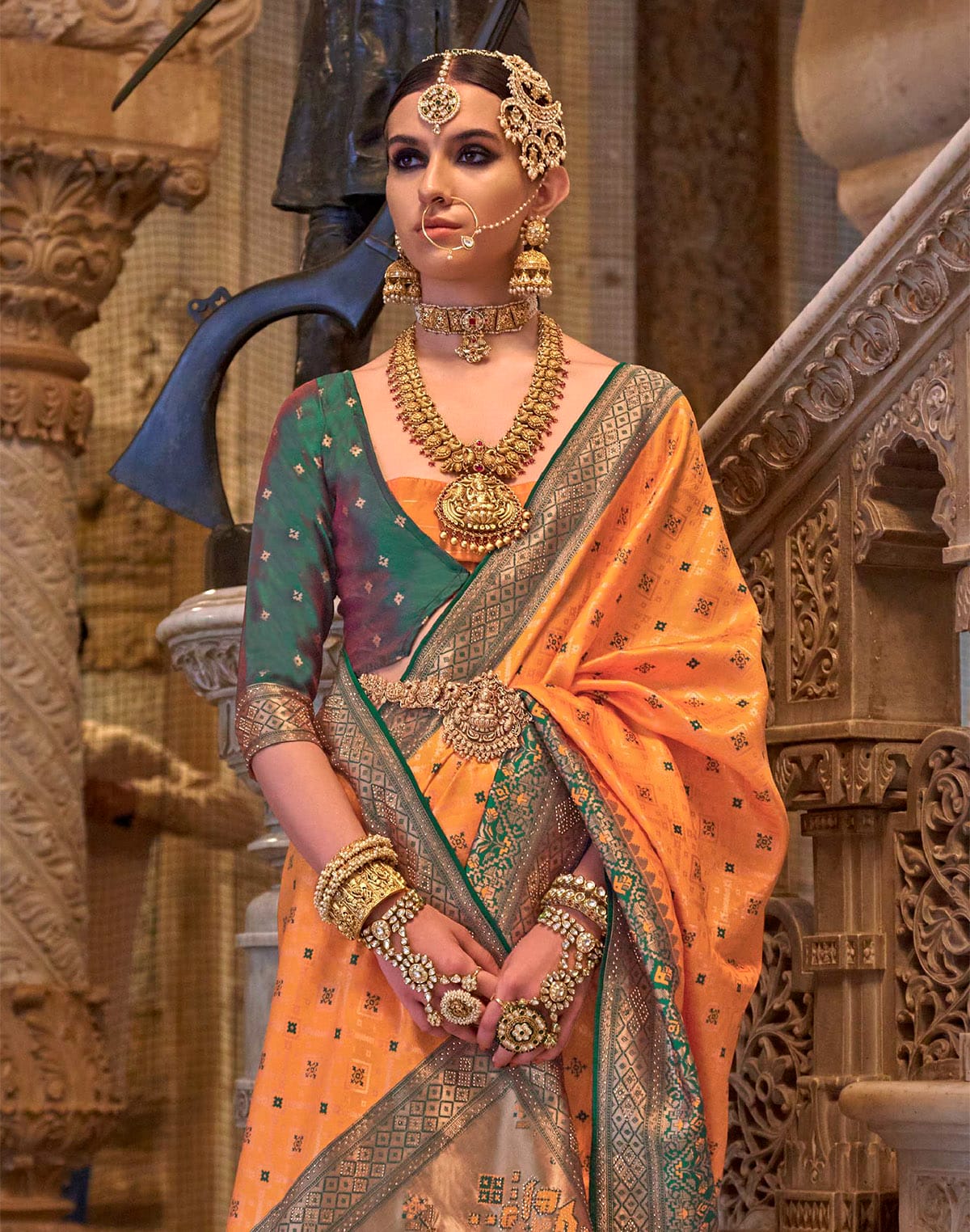 Collection of Orange Banaras Silk Stones work Saree in a gallery layout