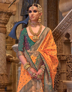 Collection of Orange Banaras Silk Stones work Saree in a gallery layout